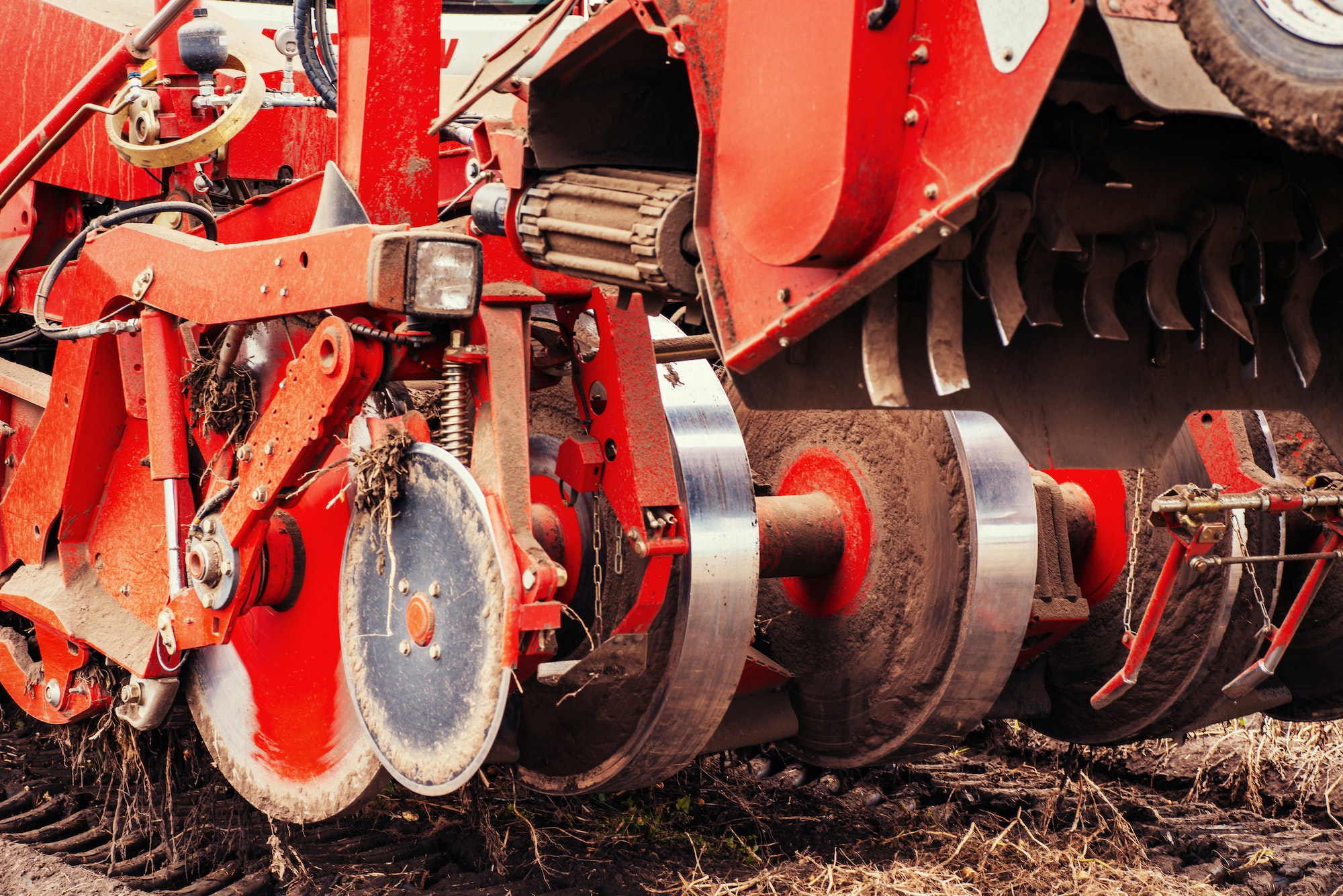 tractor ploughing up the field