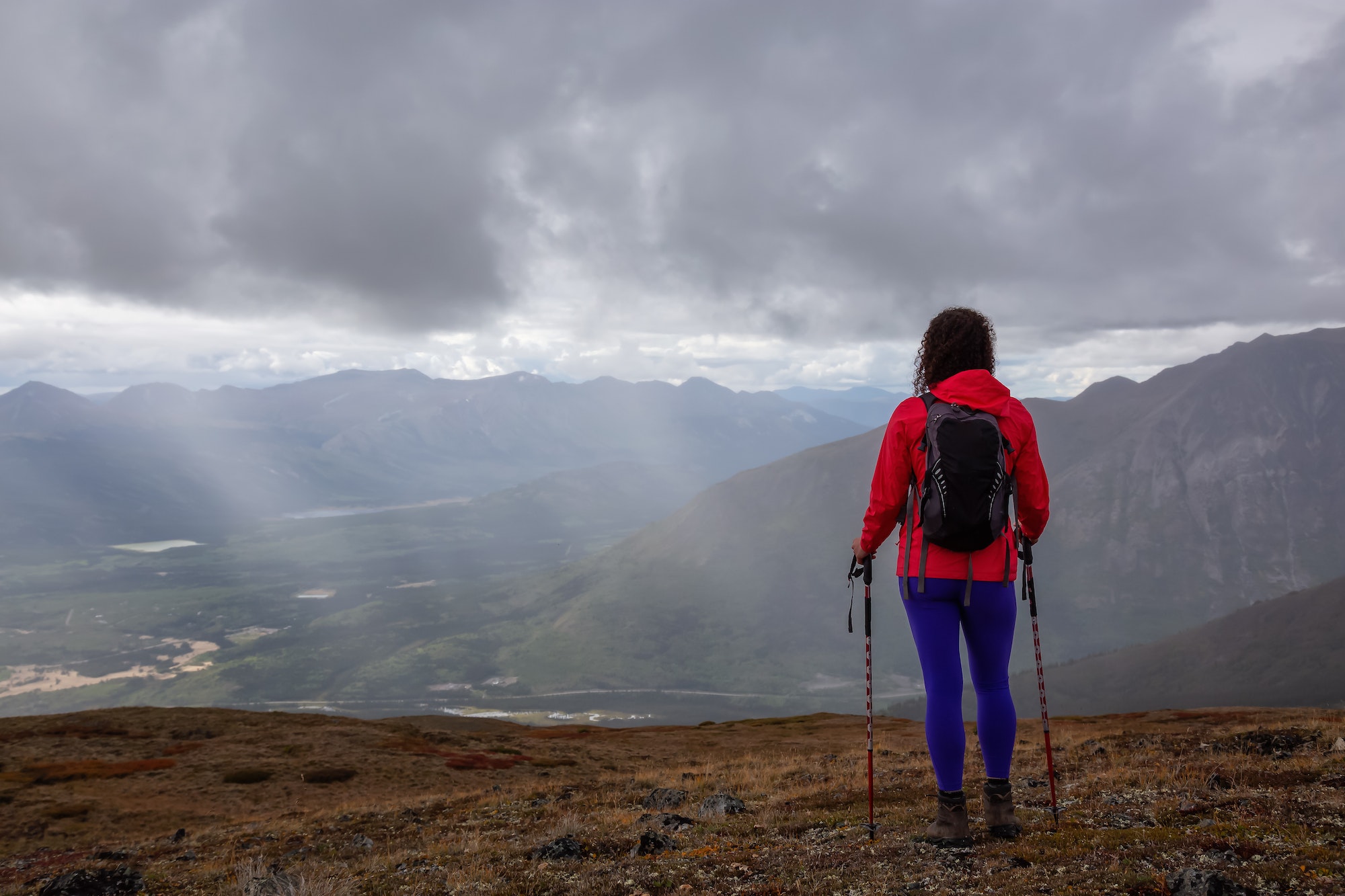 caucasian girl hiking in the mountains