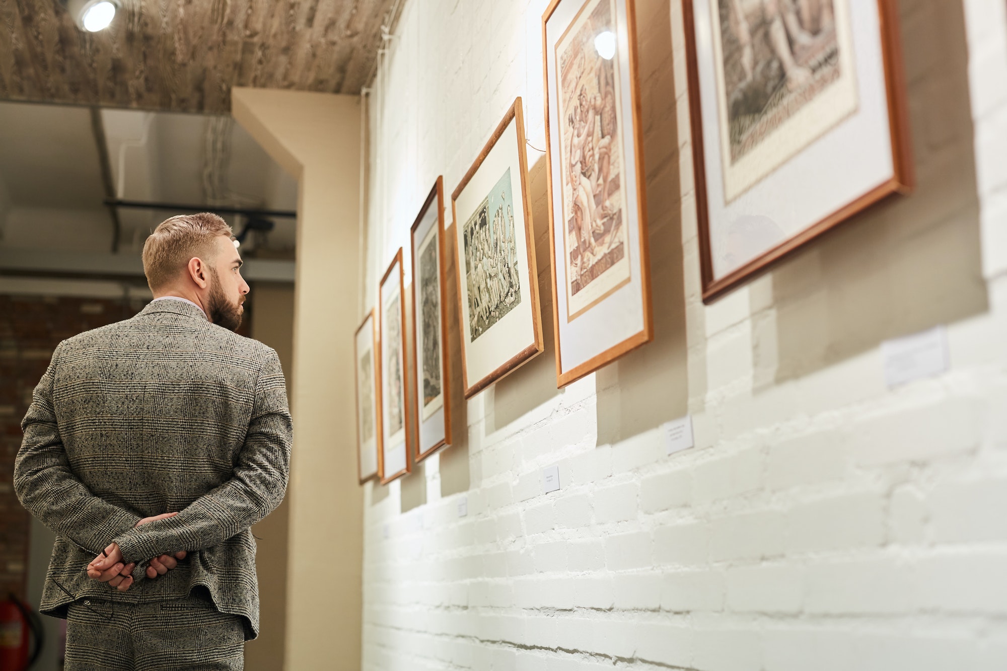 man visiting art gallery 1