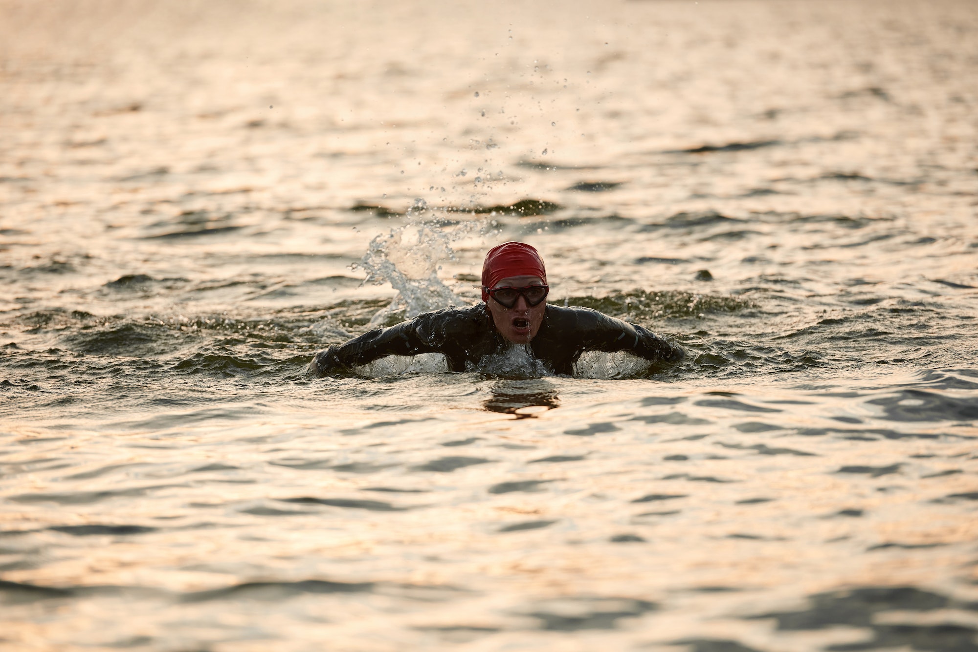 woman training to swim in the sea